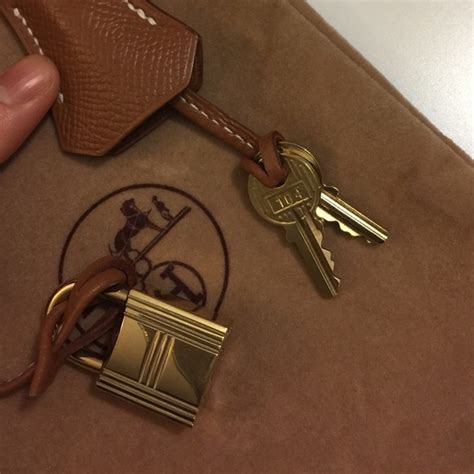 authentic hermes lock and key|lock 2 keys for birkin.